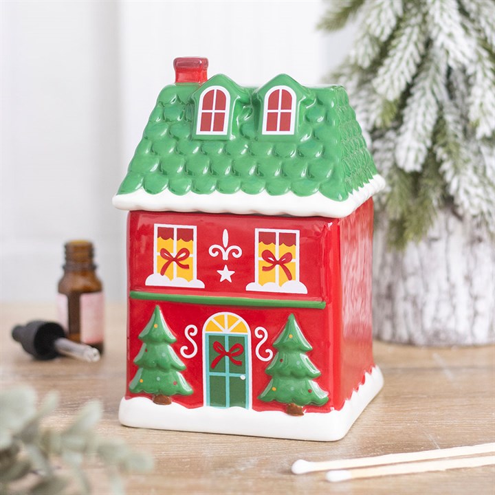 Maison de Noël rouge avec toit vert et brûleur en céramique